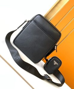 Design chic crossbody bag is crafted of Prada signature