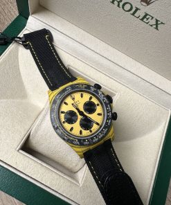 Design Daytona 116518 EWF YG on SS 904L Champagne/Black Dial Oysterflex Strap Dial