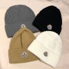 Design MONCLER Dark blue rib knitted wool beanie