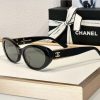 Design CHANEL Sunglasses Polarized Black Oval Gold CC